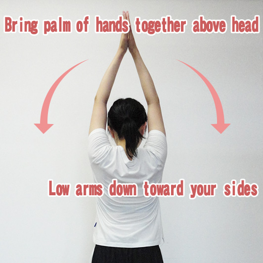 Bring palm of hands together above head