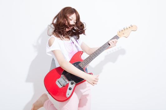 girl playing guitar