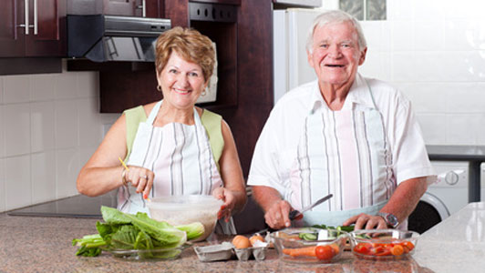 old couple cooking