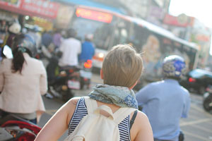 person with backpack in foriegn land 