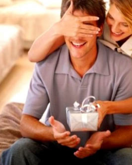 Woman preparing homemade gifts for boyfriend's birthday