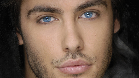 Guy with bright blue eyes.