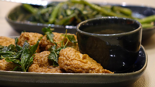 Plates with food and dipping.