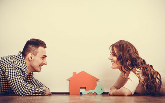 house and key between couple