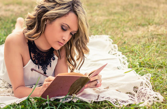 girl writing in diary