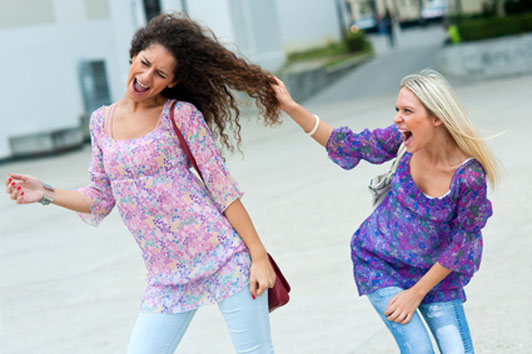 two girls fighting pulling hair