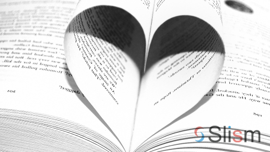 A book with two sheets shaping a heart