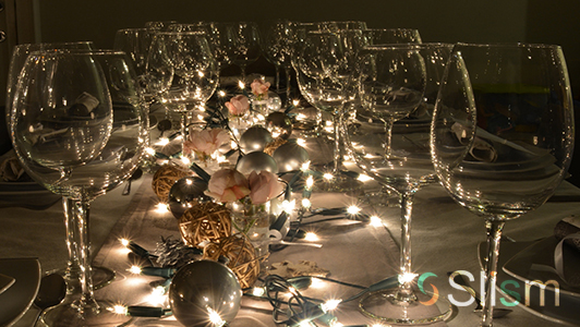 Elegant dining table with ornaments and elegant glasses