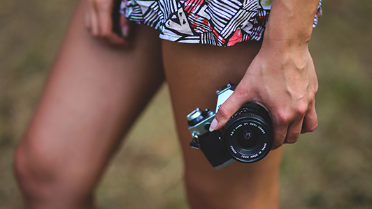 Girl taking pictures with a camera