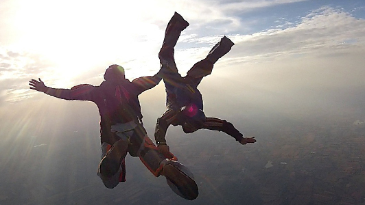 A couple skydiving