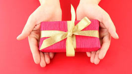 Pink present with gold ribbon