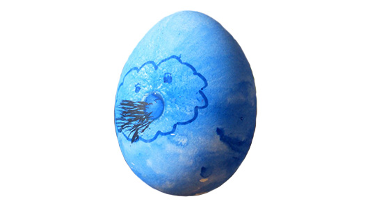 Blue egg with a drawing of a cloud