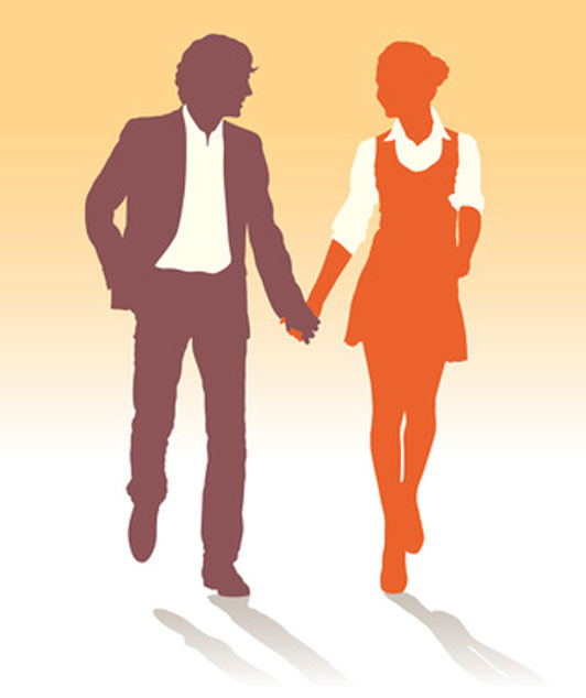 silhouette of couple walking