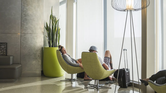 couple relaxing at airport