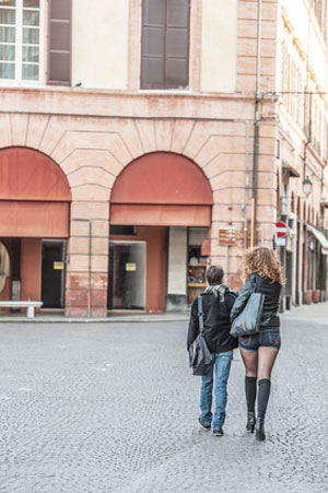 man walking next to tall woman