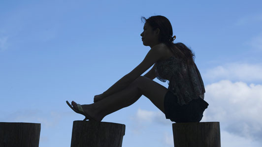 thinking girl on pillars