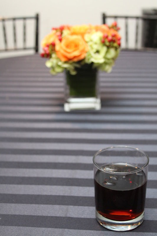 soda pop and flowers on table