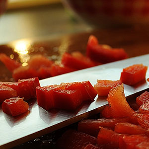 diced tuna on cutting board with knife