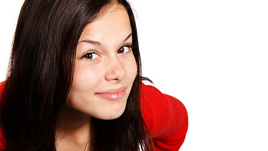 girl looking suriously and smiling