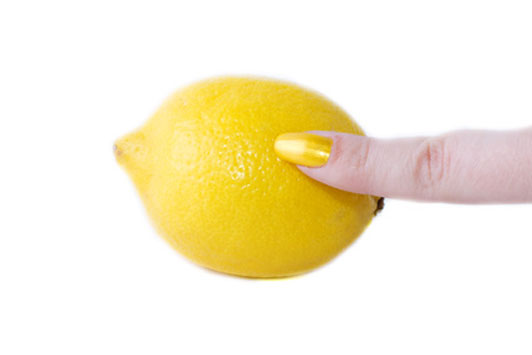 finger on lemon