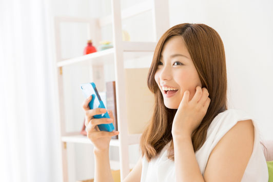 girl listening while talking on phone