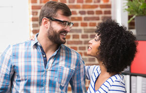 Woman complimenting a male friend