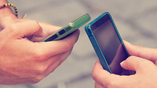 couple with smartphones