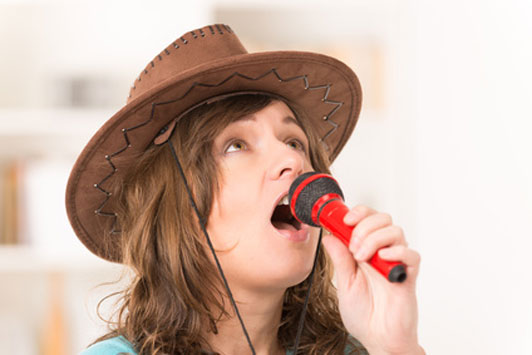 girl singing karaoke