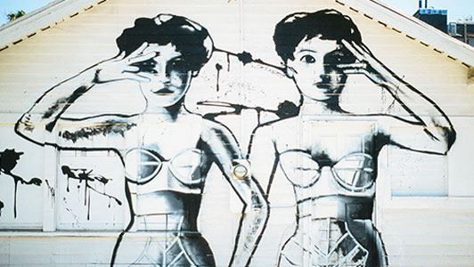 graffiti women on side of building