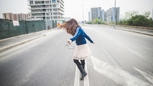 woman dancing in the street