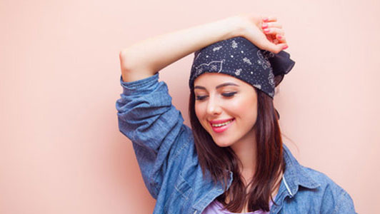 happy woman wearing bandana