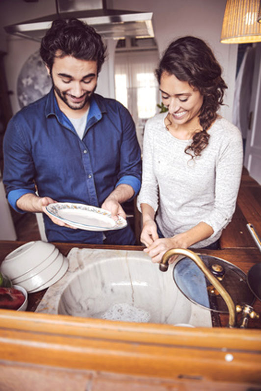 couple doing dishes