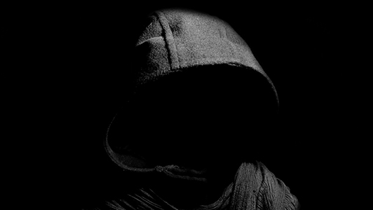 Black hoodie with no face.