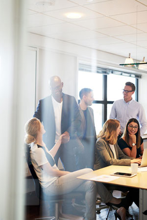 group of people talking in meeting room