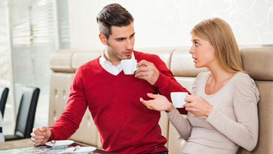 couple talking in cafe