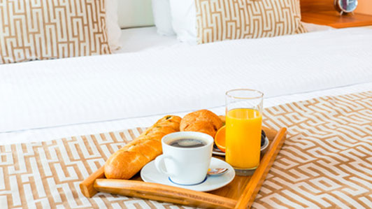 breakfast tray on bed