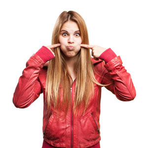 young blond woman in red jacket joking