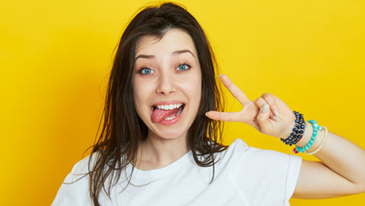 positive looking woman smiling with gesture