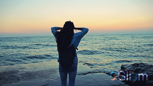 girl looking at the sea