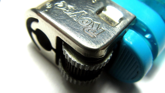 Close-up of a blue lighter.