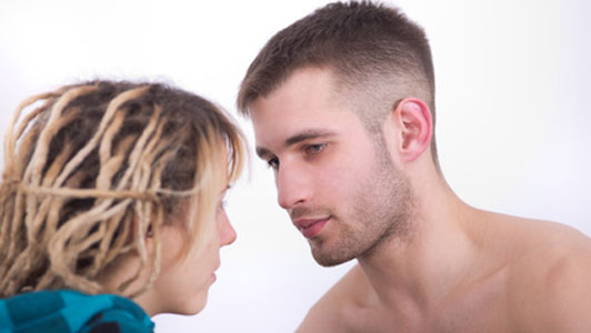 man and woman making eye contact