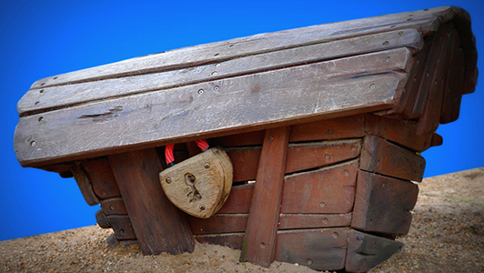 a rustic chest with a heart shaped lock