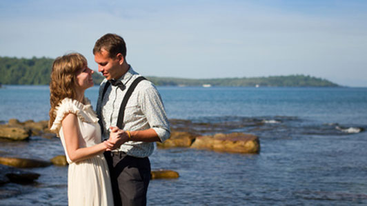 newlywed couple at waterfront