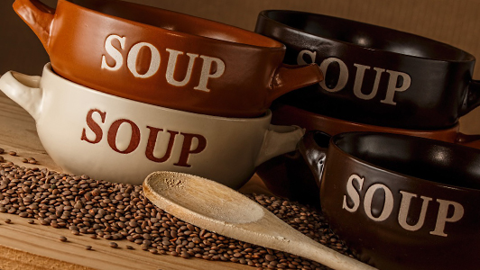 Four brown soup bowls.