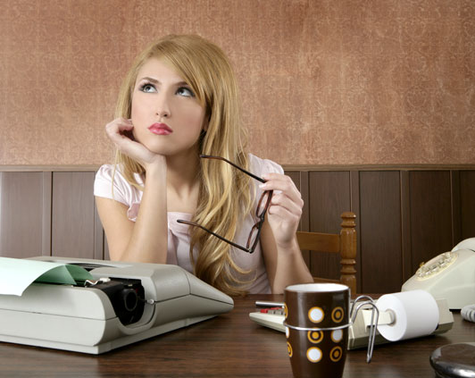 girl holding glasses thinking