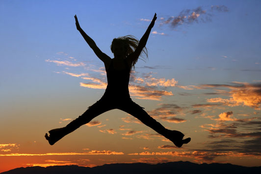 women jumping for joy