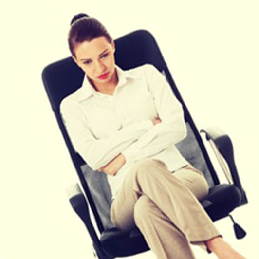 girl sitting on chair with arms crossed