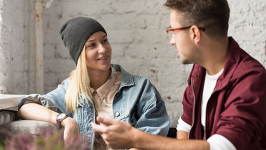 two singles in cafe talking