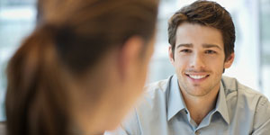 Woman looking in man’s eyes