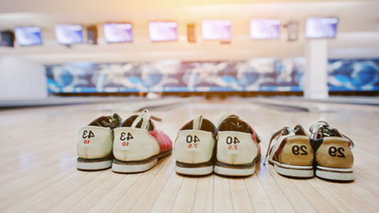 three pairs of bowling shoes